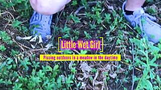 pissing outdoors in a meadow during daytime