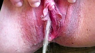milf pees outdoors behind garages with powerful stream