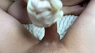 Amateur jerks cock in gloves