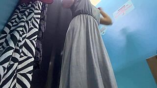 russian girl changes clothes in room