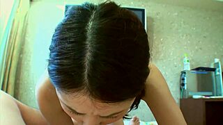 sexy brunette japan sucking cock in fishnets on bed