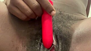 Horny black slut squirts while masturbating
