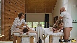 beautiful brunette receives massage from older european man