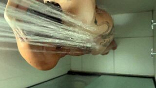 redhead trans takes shower and receives facial