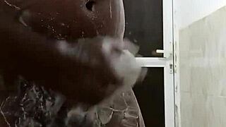 Horny guy masturbates in shower