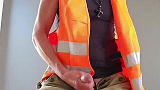Tradesman worker wanks wearing sneakers alone