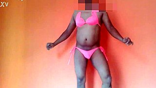 Intense shaking dance by Karaan in a pink bikini on the stage